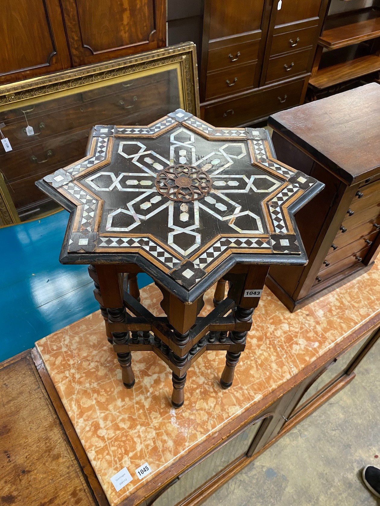 A Moorish mother of pearl inlaid occasional table, width 50cm, height 58cm